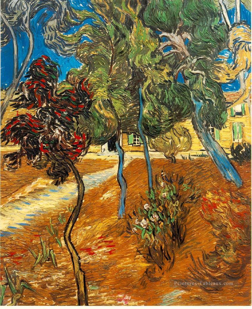 Les arbres dans le jardin d’asile Vincent van Gogh Peintures à l'huile